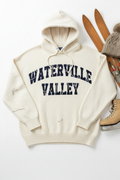 Oversized vintage cream hoodie with WATERVILLE VALLEY collegiate lettering and visible hood